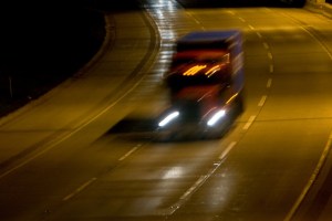 Speed-Blur-Truck-on-Interstate-at-Night
